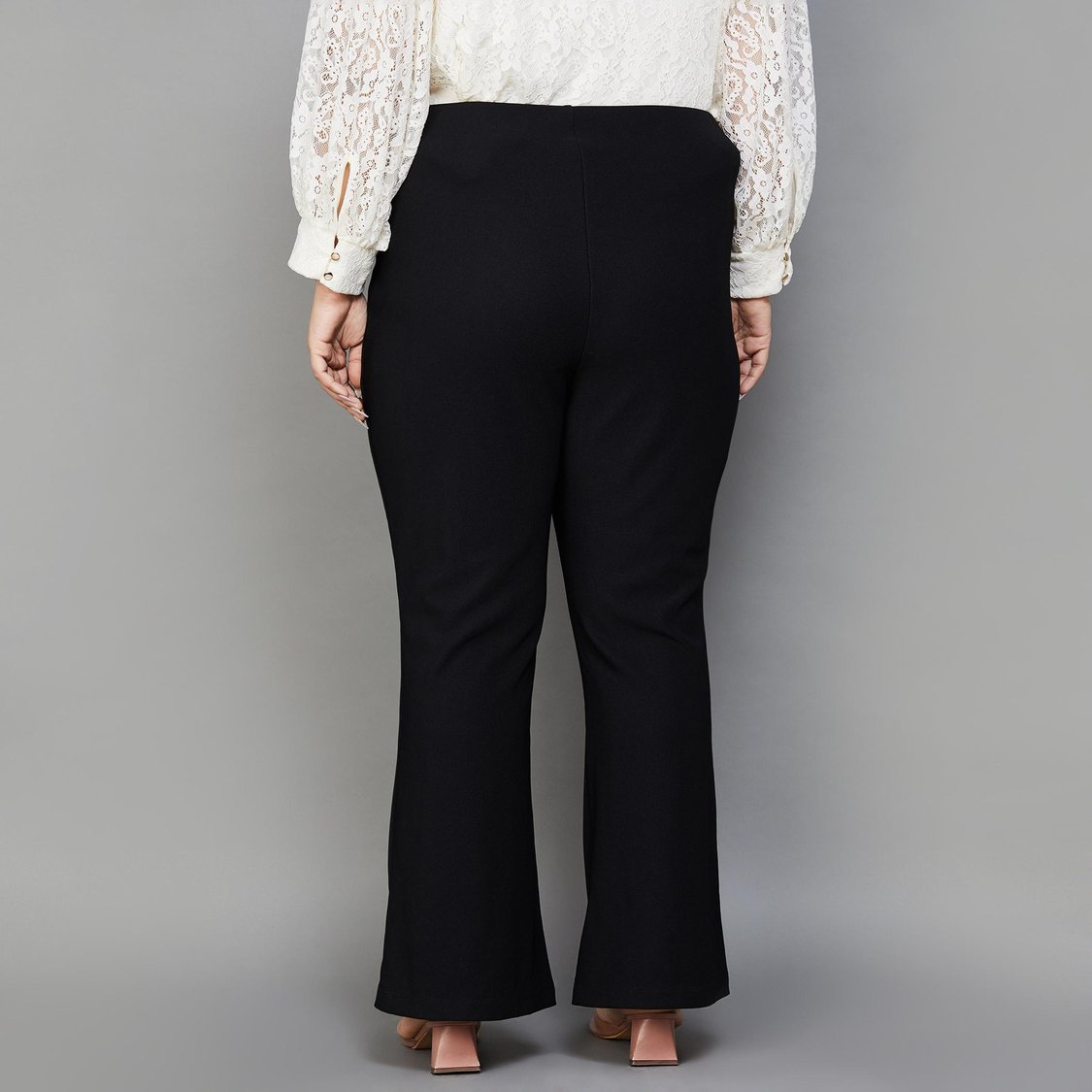 Buy NEXUS Women Solid Flared Pants from Nexus at just INR