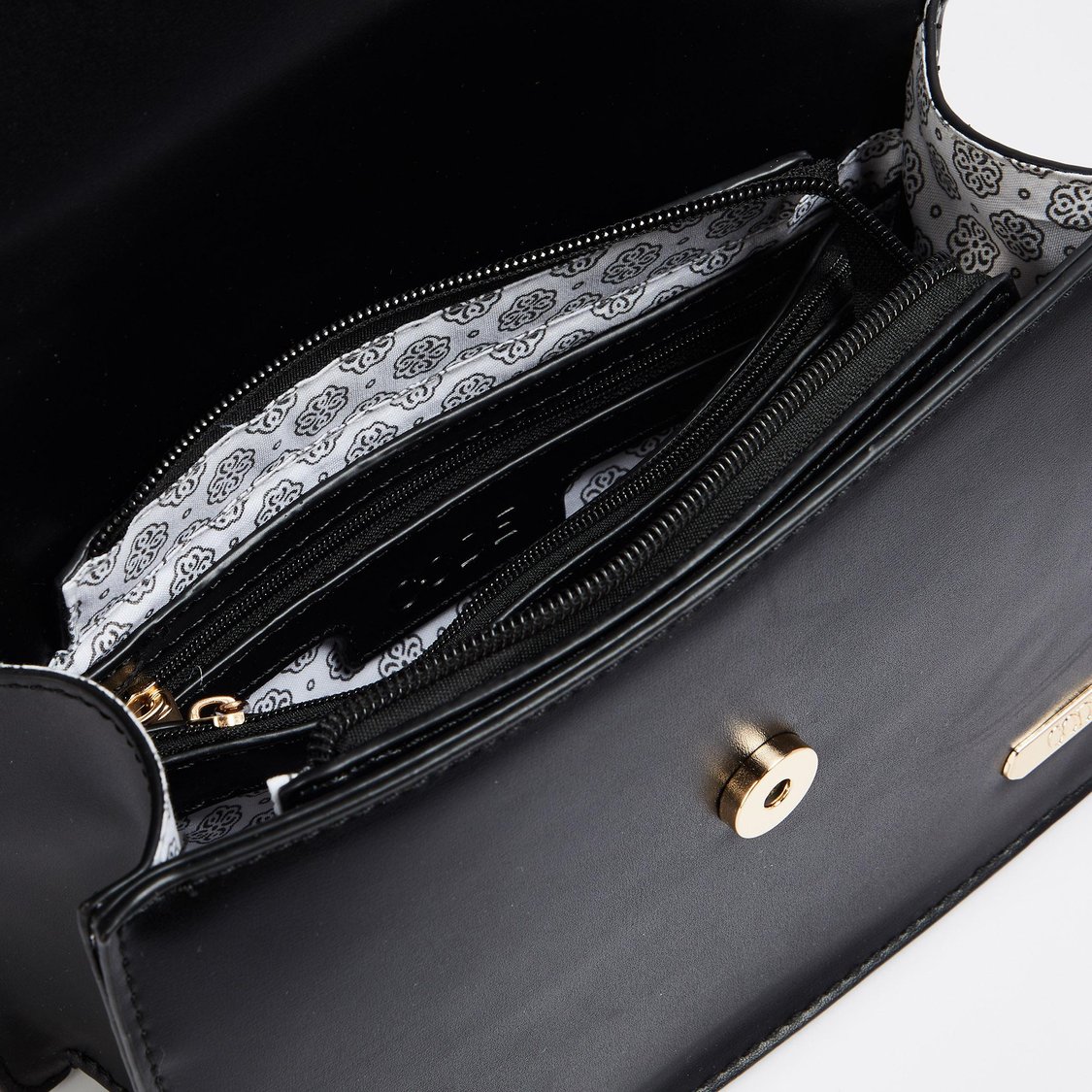 Buy CODE Women Solid Sling Bag from CODE at just INR 1999.0