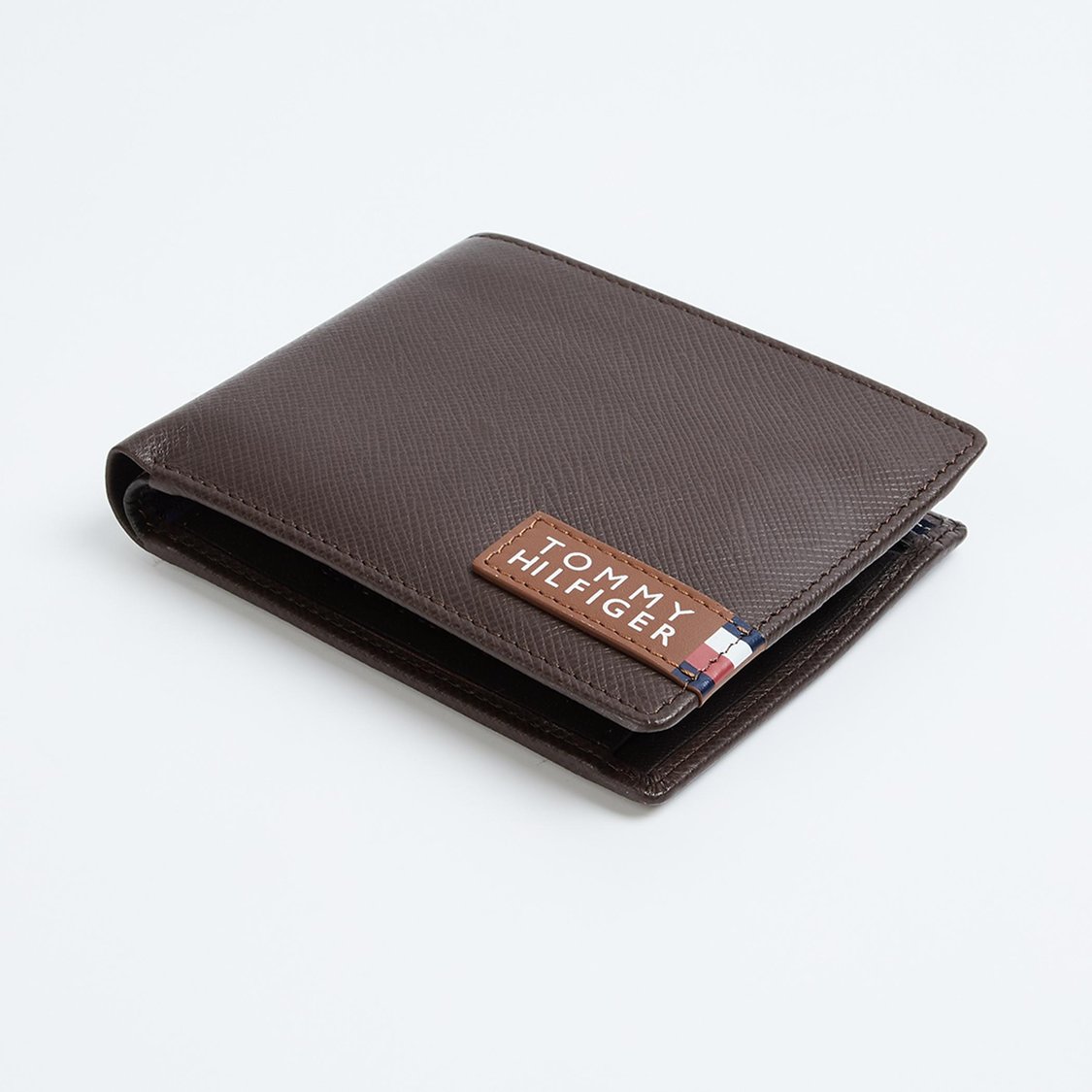 Buy TOMMY HILFIGER Men Bi Fold Leather Wallet from Tommy Hilfiger at just INR 3299.0