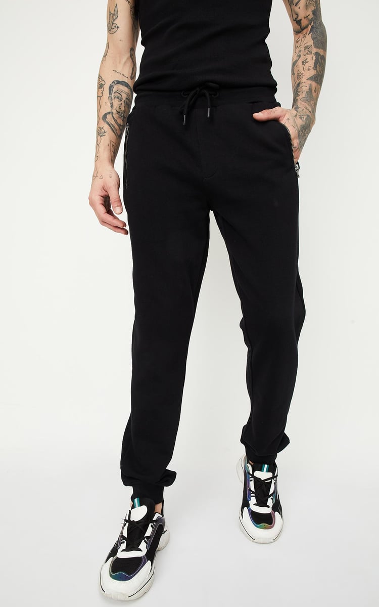 Buy Men Solid Joggers with Zip Pockets Online at just Rs. 999.0 1000013806017 Max Fashion