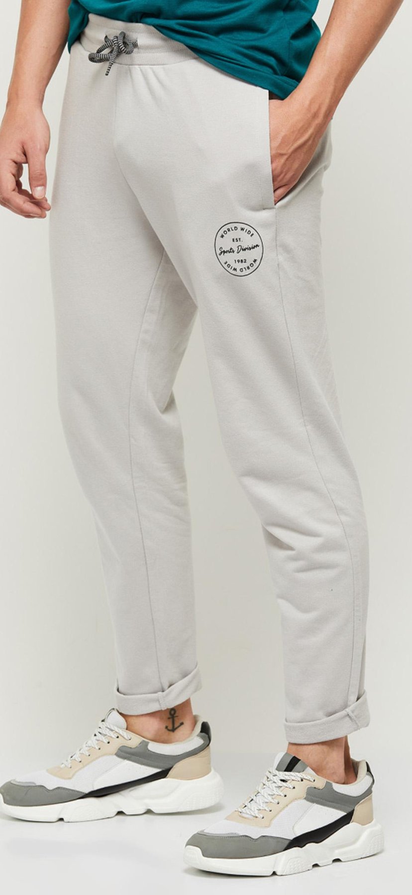 Buy Men Solid Elasticated Track Pants Online at just