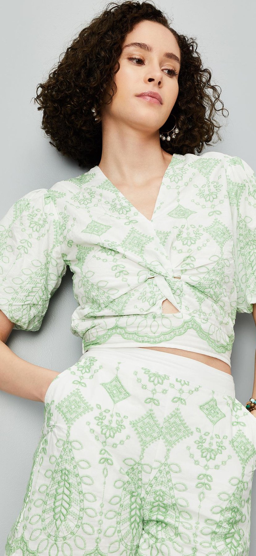 Buy Women Embroidered Twisted Front Crop Top Online at just Rs