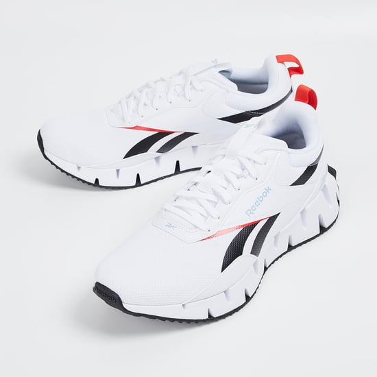 Reebok white colour shoes online