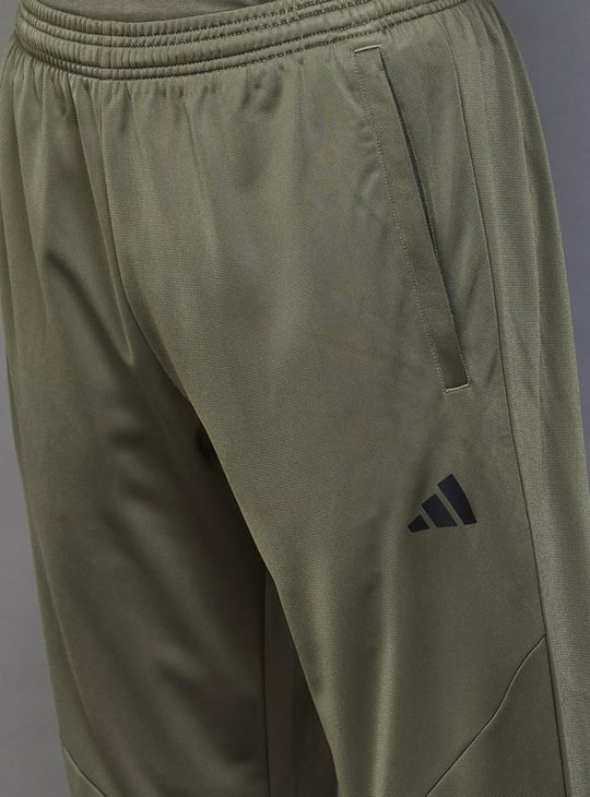 Olive green adidas track pants sale