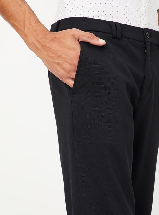 Men Solid Knit Carrot Fit Trousers
