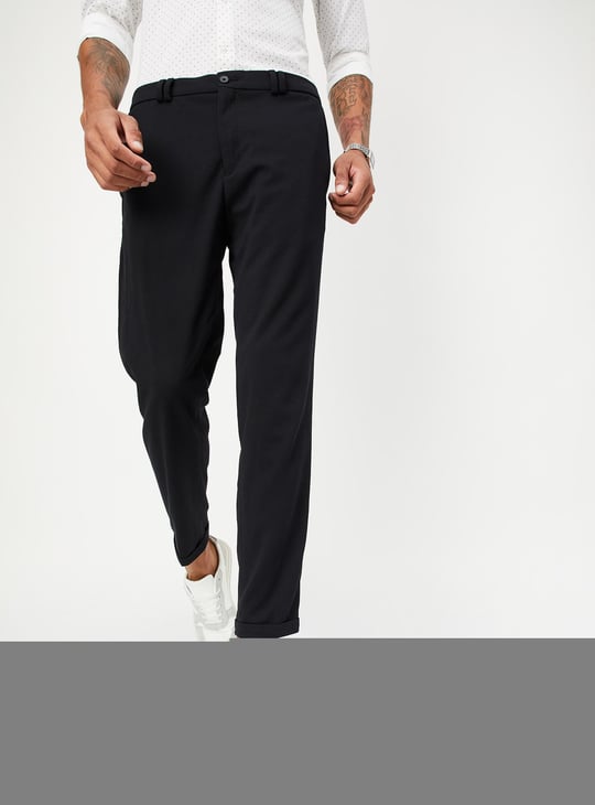 Men Solid Knit Carrot Fit Trousers