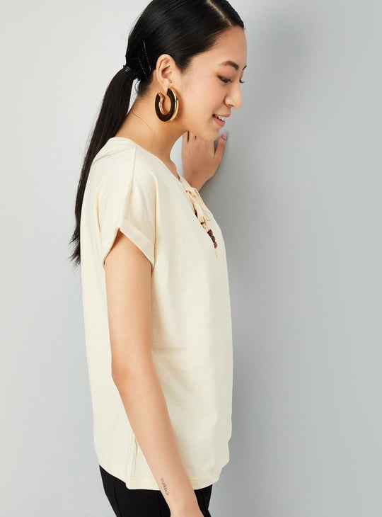 Women Solid Tie-up Neck Top