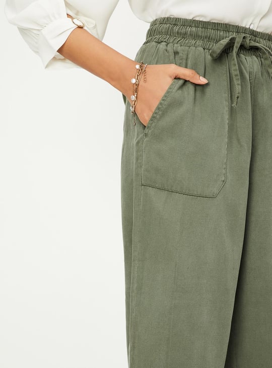 Women Solid Ankle-Length Trousers