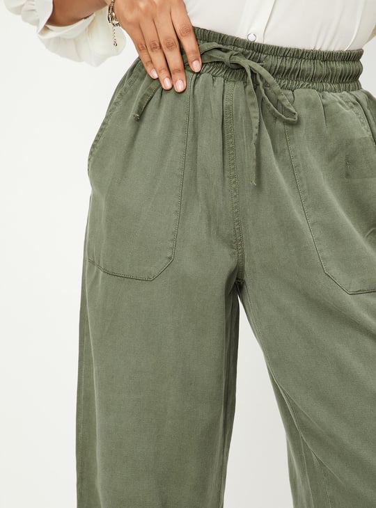 Women Solid Ankle-Length Trousers