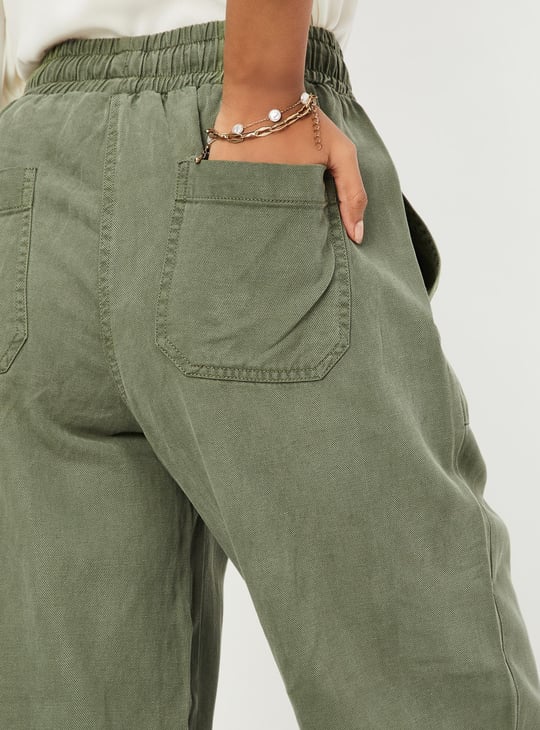 Women Solid Ankle-Length Trousers