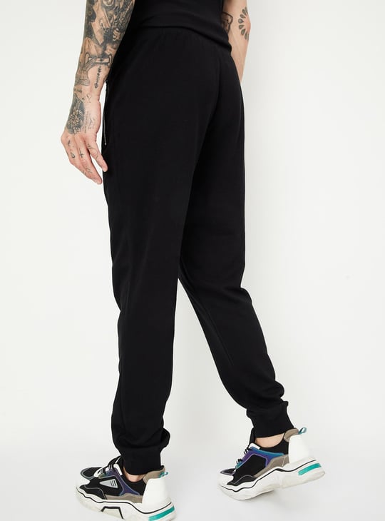 Men Solid Joggers with Zip Pockets