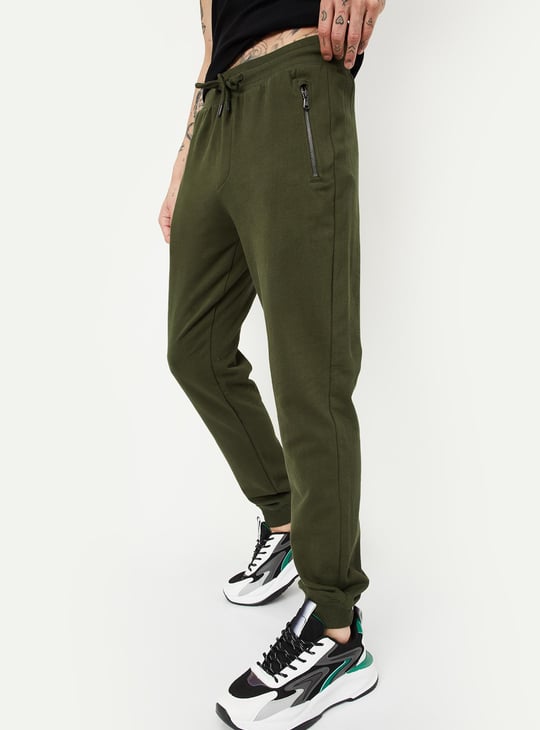 ★完売品★things that matterCHAOS JOGPANTS Buy Men Solid Joggers with Zip Pockets Online at just Rs