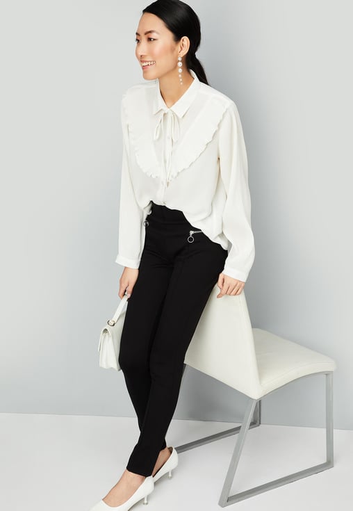 Buy Women Solid Tie-Up Neck Top Online at just Rs. 899.0