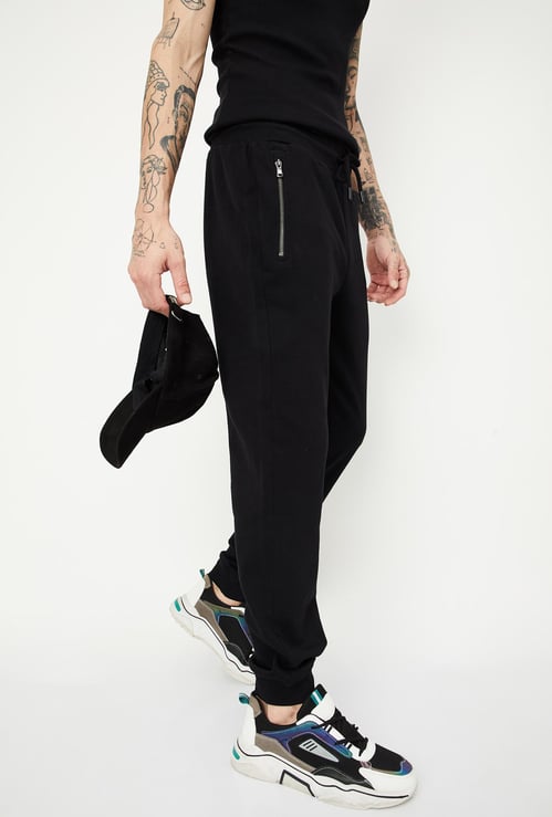 Men Solid Joggers with Zip Pockets