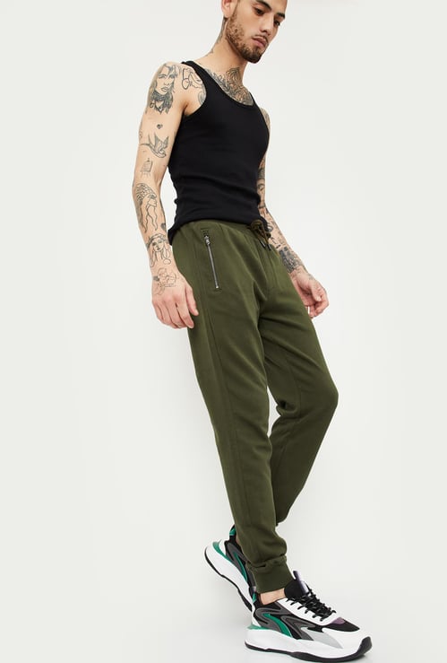 Men Solid Joggers with Zip Pockets