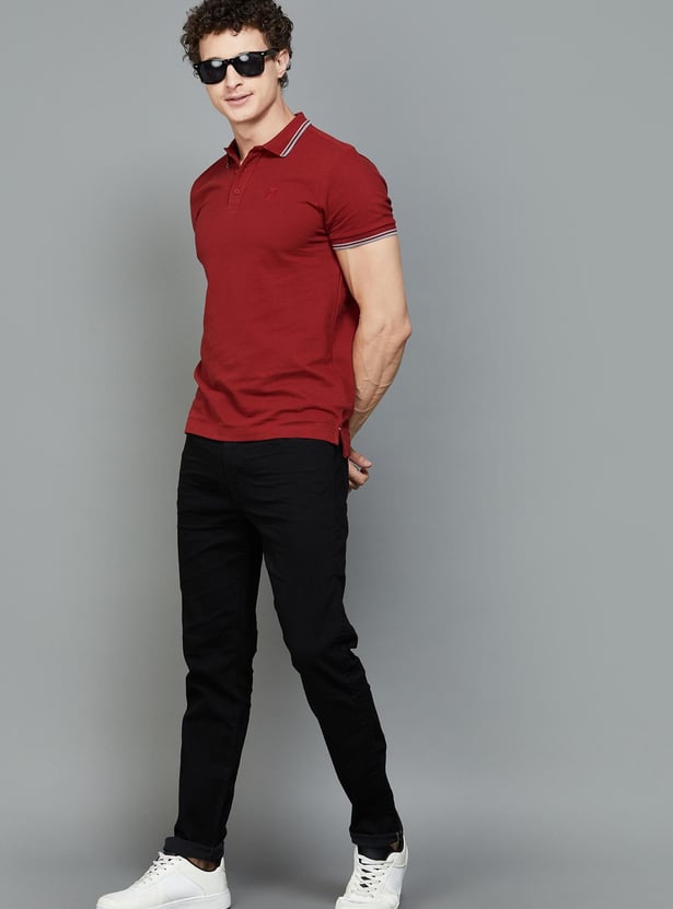 AMERICAN EAGLE Solid Slim Tapered Jeans