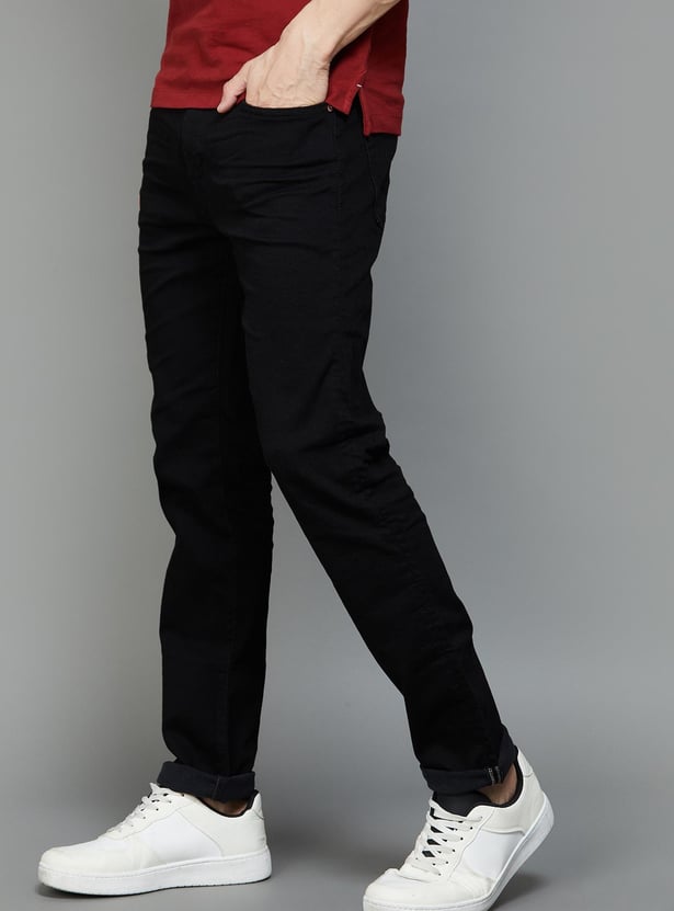 AMERICAN EAGLE Solid Slim Tapered Jeans