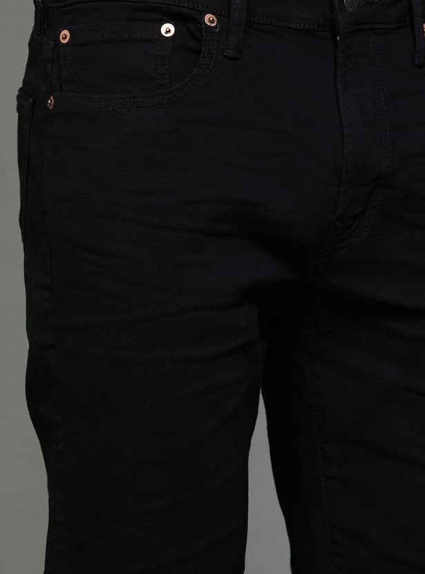 AMERICAN EAGLE Solid Slim Tapered Jeans