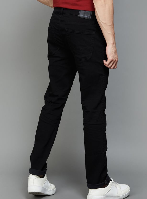 AMERICAN EAGLE Solid Slim Tapered Jeans