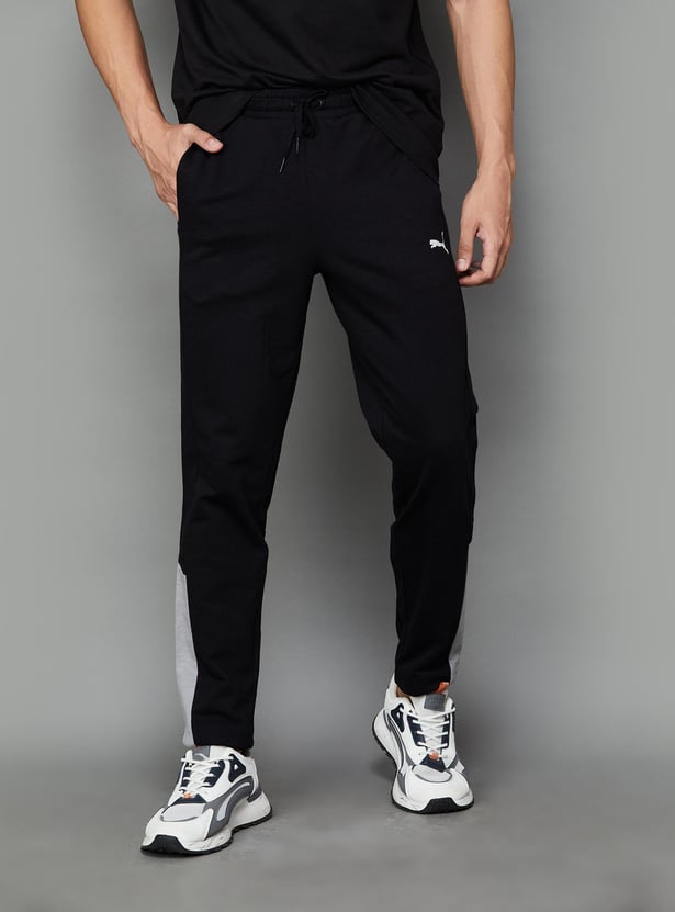 Buy PUMA Men Colourblocked Regular Fit Track Pants from PUMA at just INR 2999.0