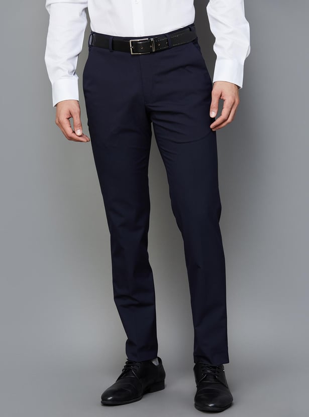 Buy PARK AVENUE Men Solid Super Slim Formal Trousers from Park Avenue ...