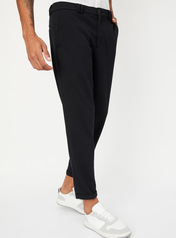 Men Solid Knit Carrot Fit Trousers