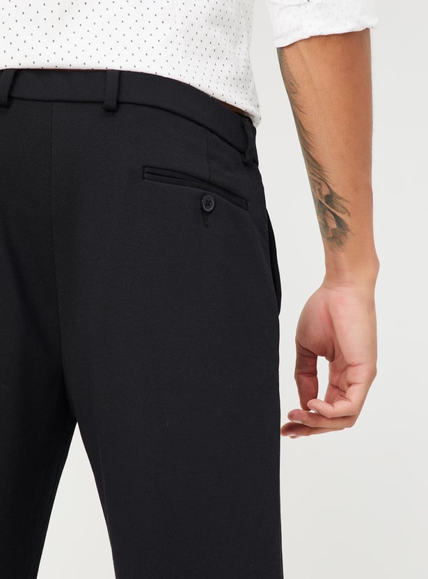 Men Solid Knit Carrot Fit Trousers