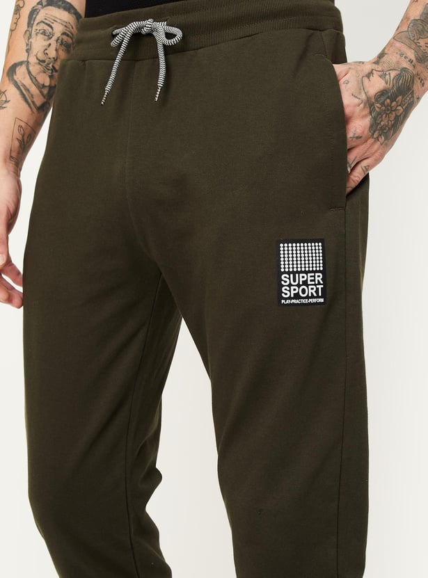 Men Solid Athleisure Track Pants