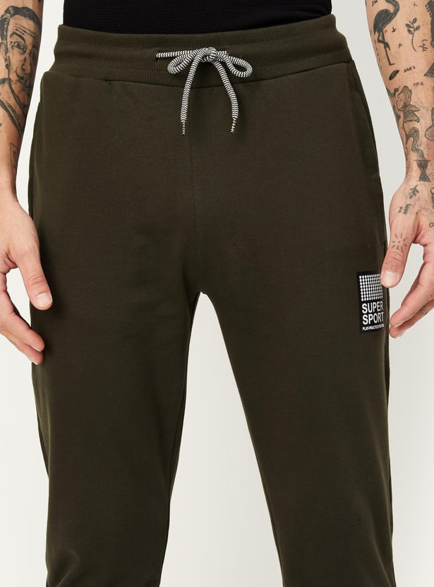 Men Solid Athleisure Track Pants