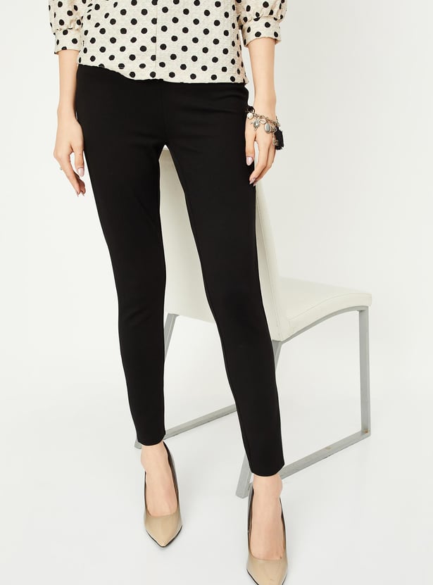 Women Solid Button Accent Treggings