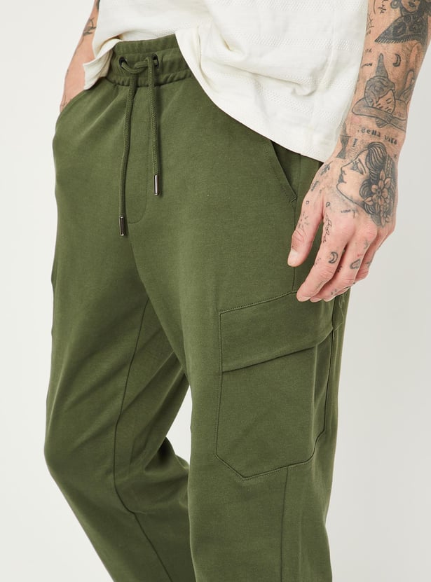 Buy Men Solid Cargo Track Pants Online at just Rs. 1299.0 ...