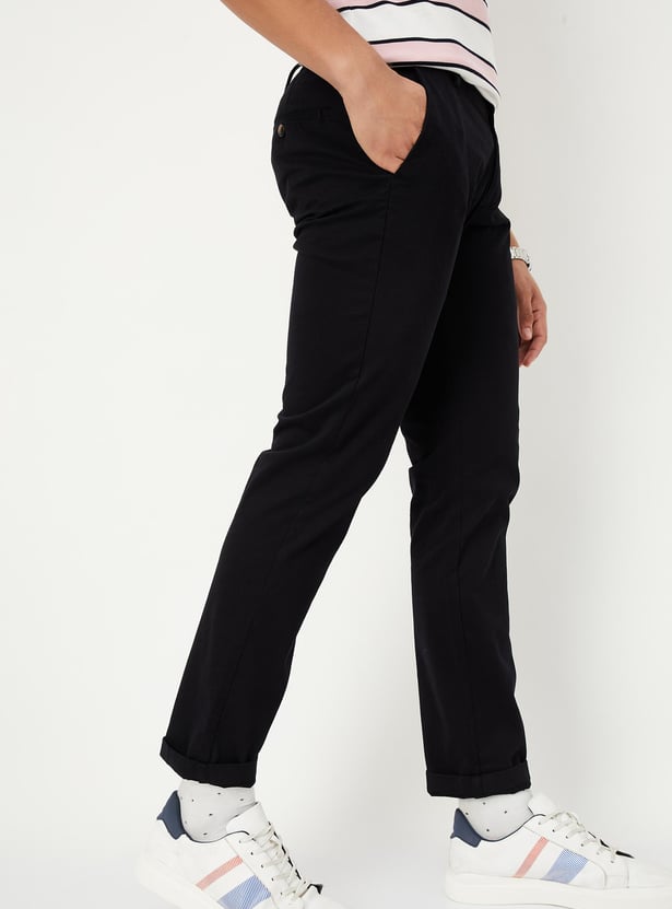 Buy Men Slim Fit Solid Casual Trousers Online at just Rs. 1399.0 ...