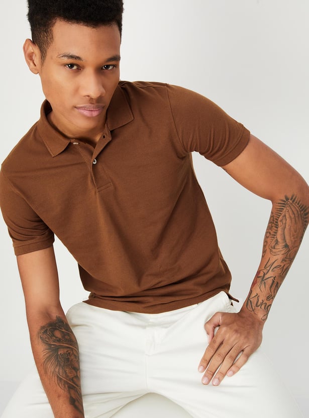 Buy Men Slim Fit Solid Polo T-shirt Online at just Rs. 399.0 ...