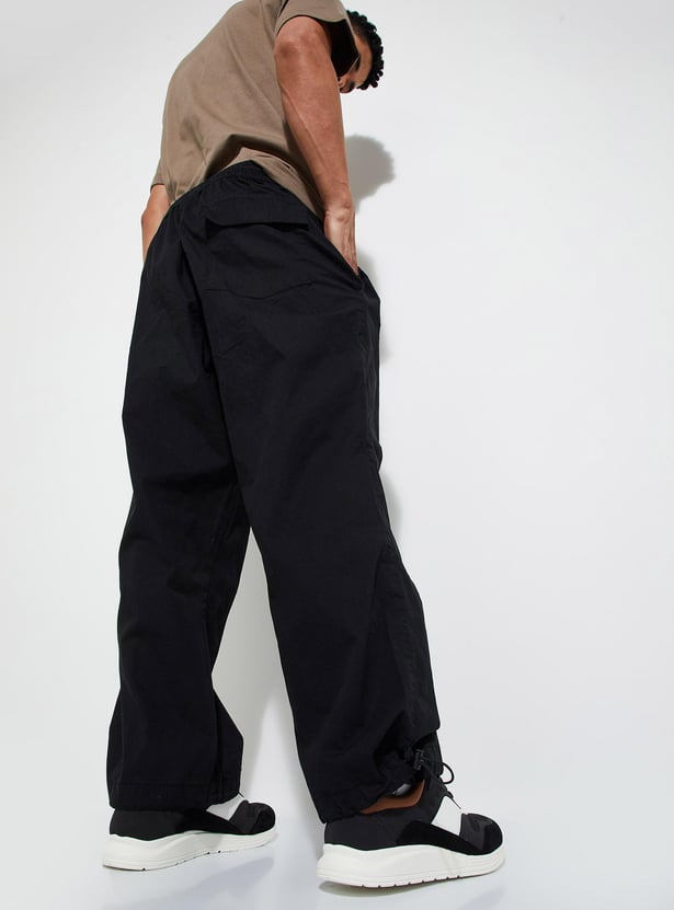 Buy URB_N Men Solid Parachute Trousers Online at just Rs