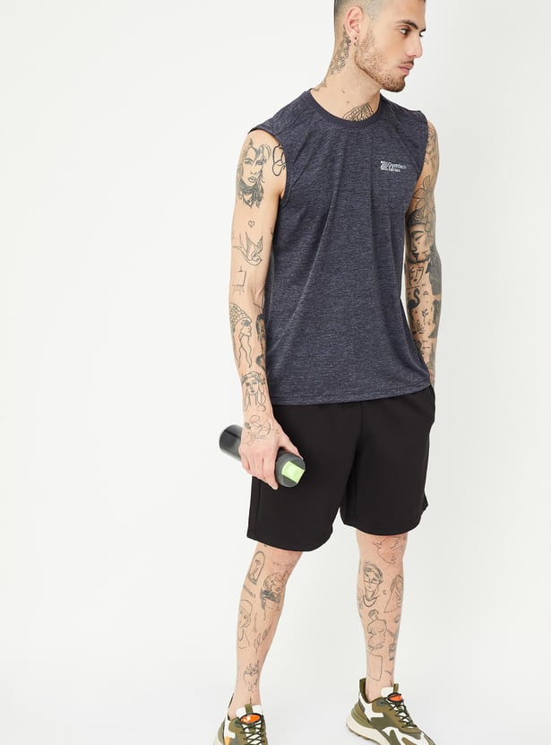 Buy Men Solid Slim Fit Training Tshirt Online at just Rs. 349.0