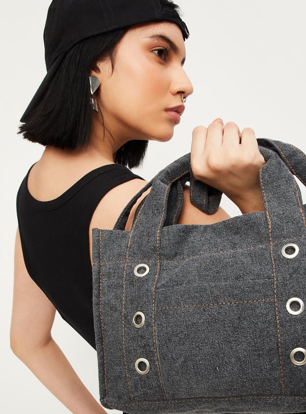 Women Denim Sling Bag with Grommets