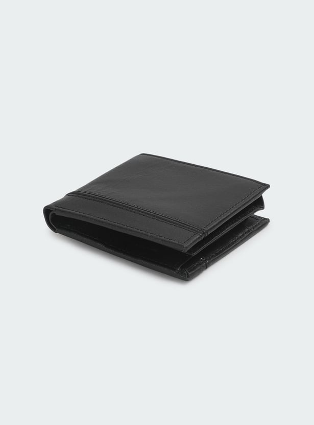 Buy Men Solid Bi-Fold Wallet Online at just Rs. 699.0