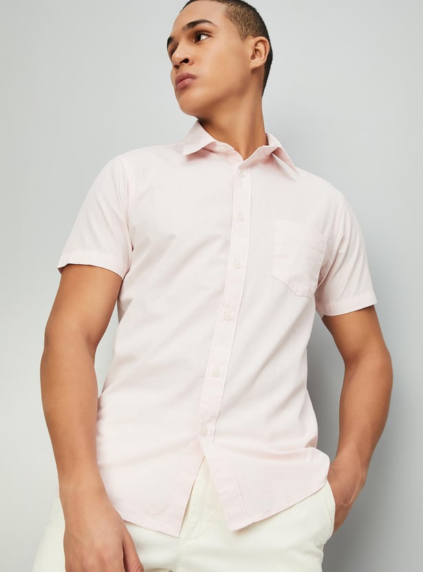 Buy Men Regular Fit Solid Casual Shirt Online at just Rs. 799.0