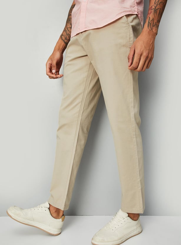 Buy Men Solid Stretchable Slim Fit Chinos Online at just Rs