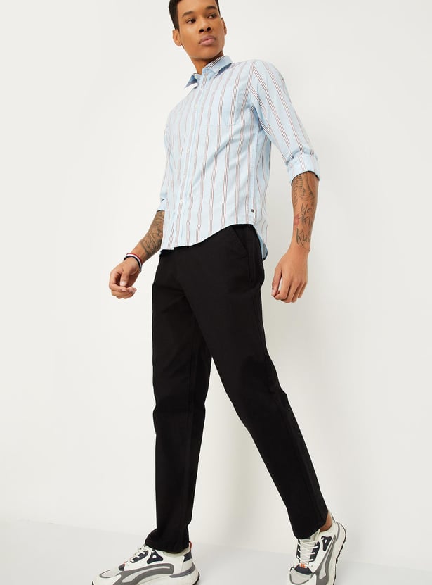 Buy Men Solid Stretchable Slim Fit Chinos Online at just Rs