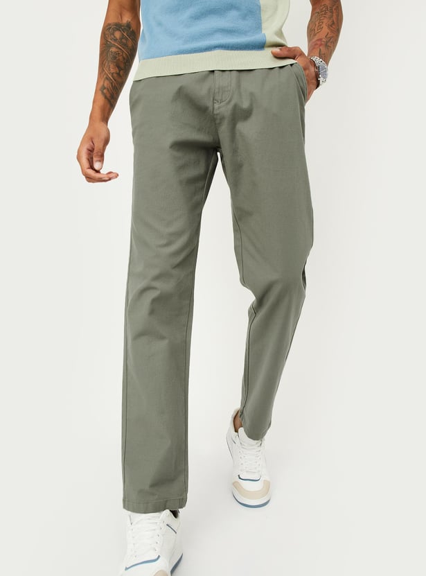 Buy Men Solid Stretchable Slim Fit Chinos Online at just Rs. 1399.0 ...