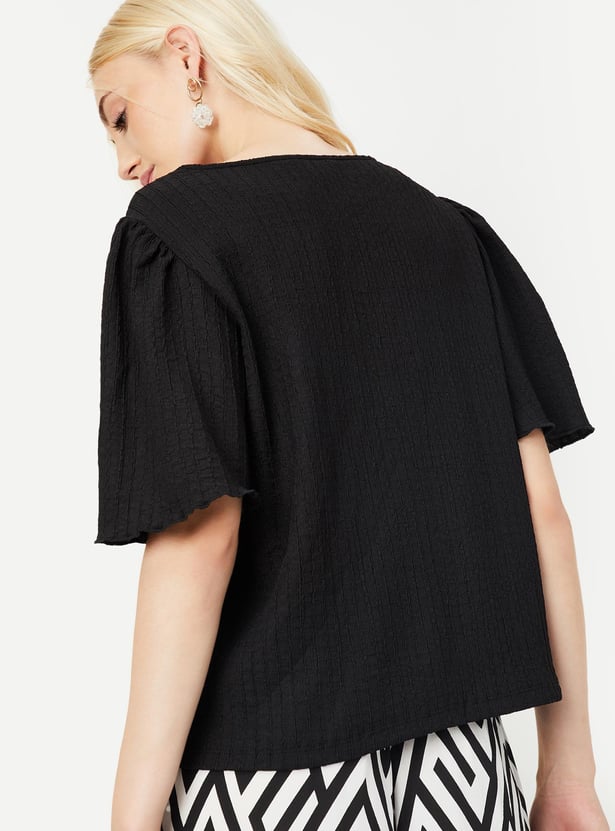 Buy Women Textured Knit Top Online at just Rs. 699.0