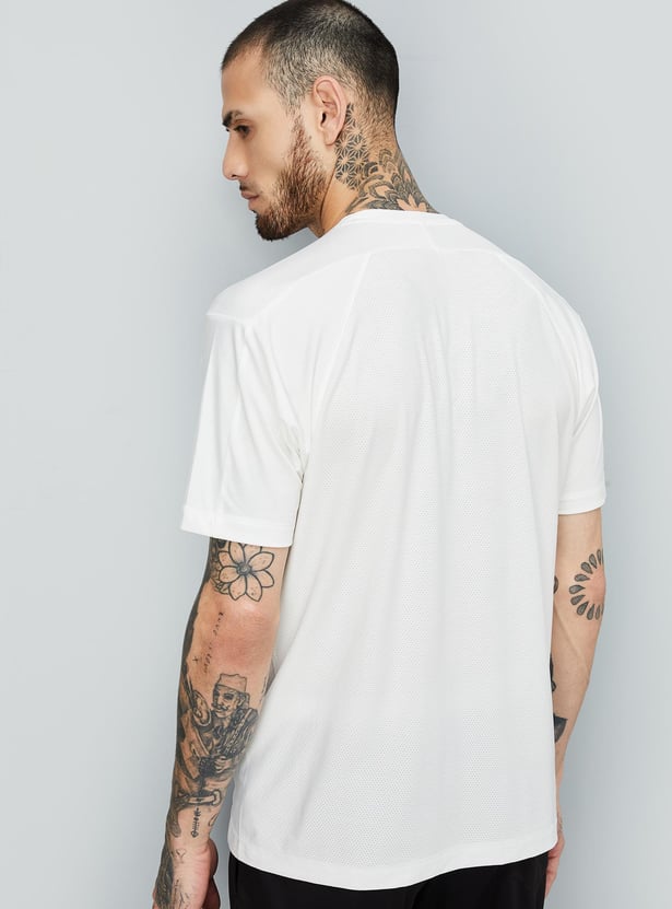 Men Solid Sports T-shirt