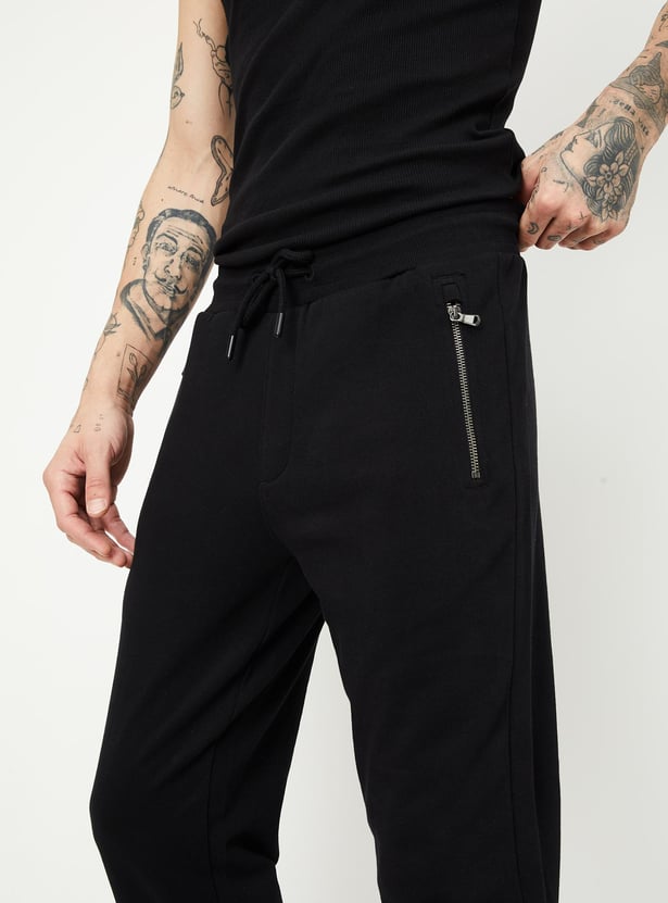 Buy Men Solid Joggers with Zip Pockets Online at just Rs. 999.0 1000013806021 Max Fashion