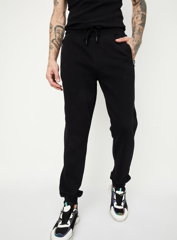 Men Solid Joggers with Zip Pockets