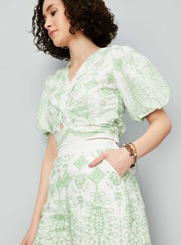 Buy Women Embroidered Twisted Front Crop Top Online at just Rs